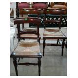 Three rush bottom chairs - one is shaky / needs