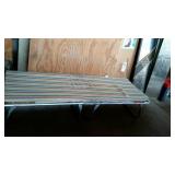 Folding camping cot with thin mattress