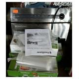 Food Saver machine with assorted bags, and
