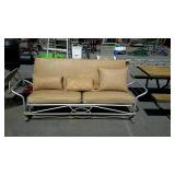 Metal framed patio sofa with cushions