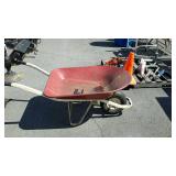 Red wheel barrow, tire does need air