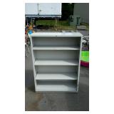 Metal book case, measures 35 inches long, by 14