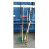 Tool lot, includes leaf rakes, and two pick axes