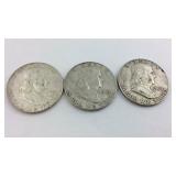 Three 1962D Franklin halves
