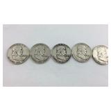 Five 1954D Franklin halves