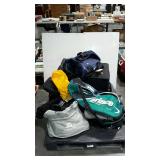 Skid lot - luggage, duffle bag, purse, hard hat,
