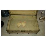 Flat top trunk with wood straps and metal trim,