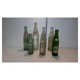 Soda bottles, mountain dew, Pepsi, dr. Pepper etc