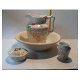 Pitcher and wash bowl with matching soap dish and