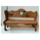 Small wooden bench, measures 26 inches long, by 9