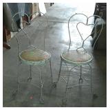 Two ice cream parlor chairs, just need a fresh