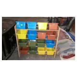 Kids book shelf, with plastic storage containers