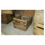 Wooden crate missing boards on bottom