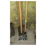Group of hand tools - rake, edger, shovel etc