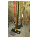 Group of hand tools -limb pruner, broom,