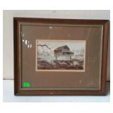 Framed print of a farmer out side his barn in