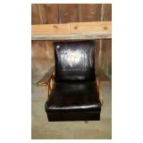 Swivel rocking chair, oak framed with wagon wheel