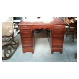 Knee hole desk with wood pulls and backsplash