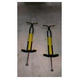 Group lot, includes two pogo sticks
