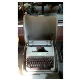 vintage Olympia typewriter in carrying case, will