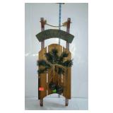 Seasonal welcome decor sled