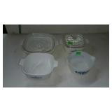 Three Corning ware casserole dishes with two l