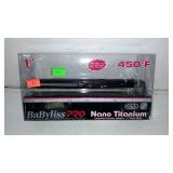 Curl and straightening iron. New in package.