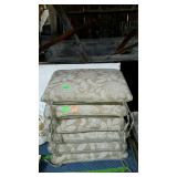 Group of six patio chair cushions
