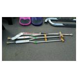 Group lot, includes set of crutches and a hockey