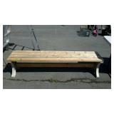 Wooden bench with plastic feet, measures 72