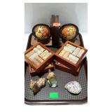 Tray lot : cork coasters, globe bookends, carved