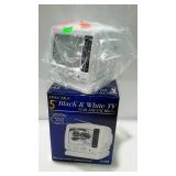 5" B&W TV with radio. New in box.