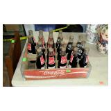 Coca-Cola bottle crate with bottles in divided