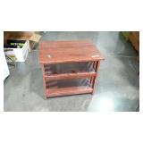 Mission style end table with open shelves.