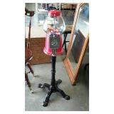 Gumball machine with stand. Includes some