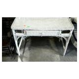 Glass top wicker desk, measures 40 inches long,