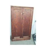 This end up style wardrobe. Dark stained pine.