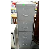 Four drawer filing cabinet, measures 15 by 29, by