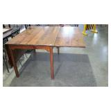 Pine drop leaf table, measures 48 by 32, with two