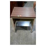 Type written stand, measures 23 by 19, by 26