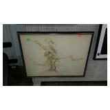 Framed picture of a tree in what appears to be