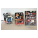 Three Mark Martin 1:64 scale stock cars, one with