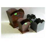 Group of four metal planters. Assorted sizes and