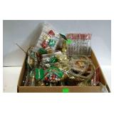 Box full of wire garland in assorted styles.