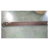 Three decorative curtain rods - 57" long