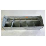 Galvanized divided hardware tote with handle.