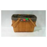 2002 Longaberger magazine basket with liner.