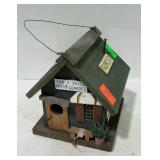 Birdhouse in shape of florist shop.