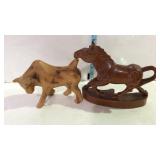 Carved figures- one 7" long horse, and one 4" tall