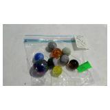 Group of 9 old WV glass shooter marbles, various